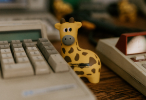 giraffe mascot figurine